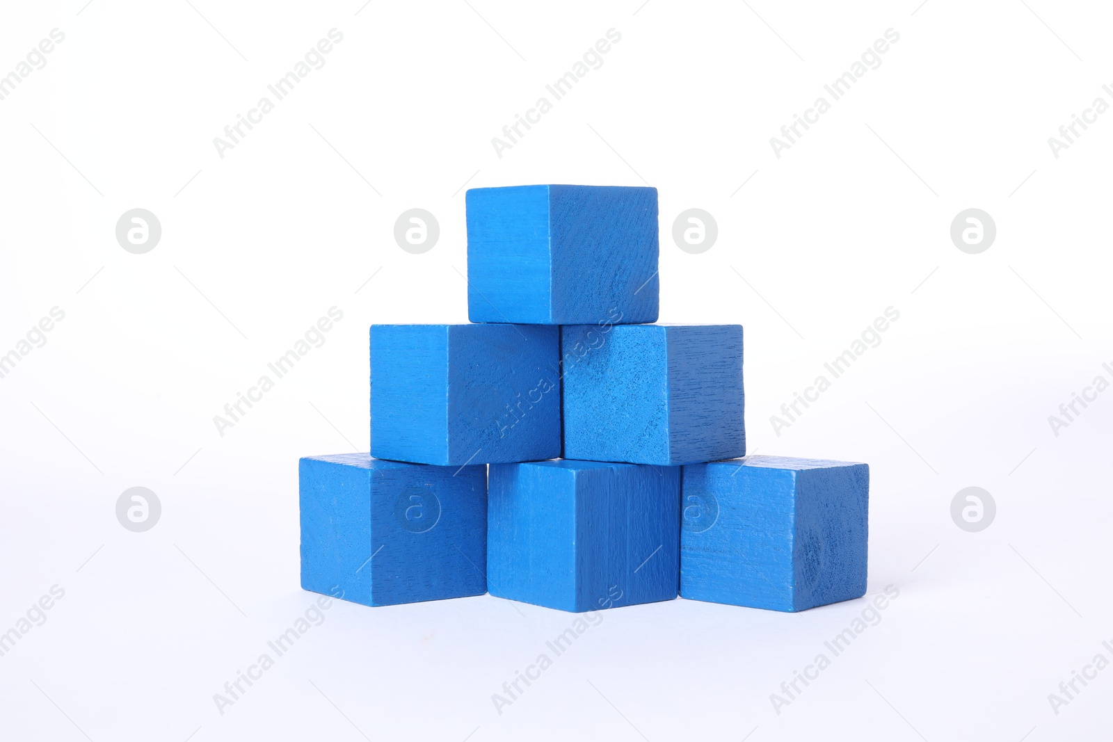 Photo of Many blue wooden cubes on white background