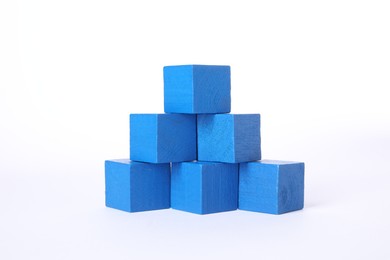 Many blue wooden cubes on white background