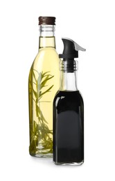 Balsamic vinegar in bottle and oil isolated on white