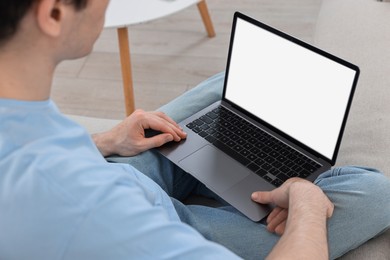 Photo of Sick man having online consultation with doctor via laptop at home, closeup