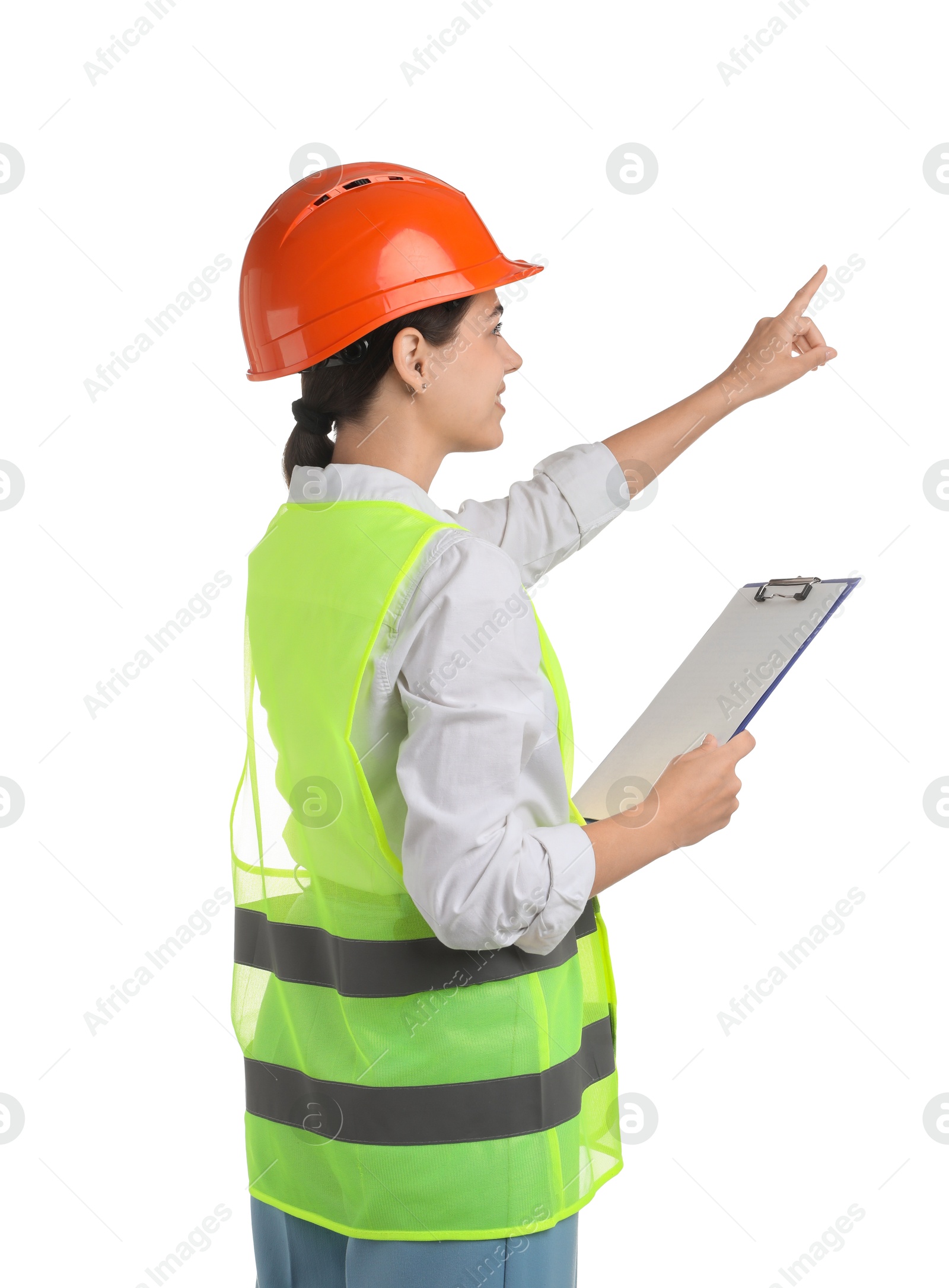 Photo of Engineer in hard hat with clipboard on white background