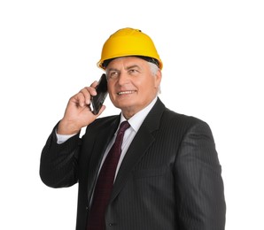 Photo of Engineer in hard hat talking on smartphone against white background