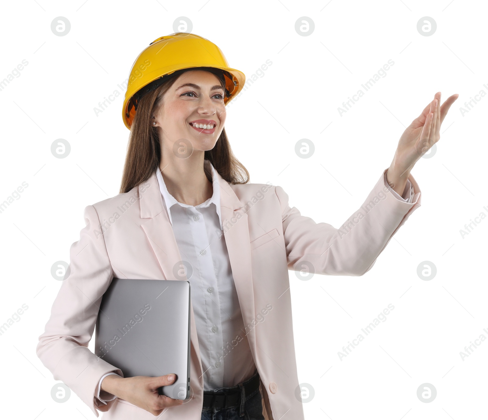 Photo of Engineer in hard hat with laptop on white background