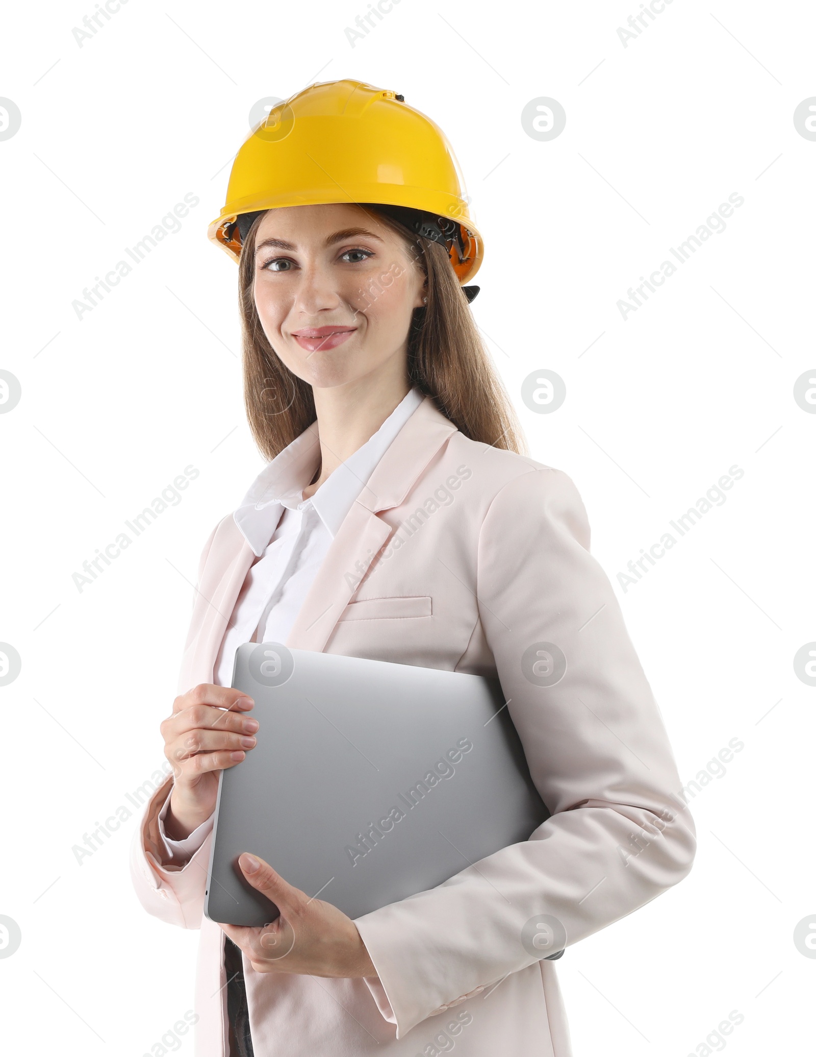 Photo of Engineer in hard hat with laptop on white background