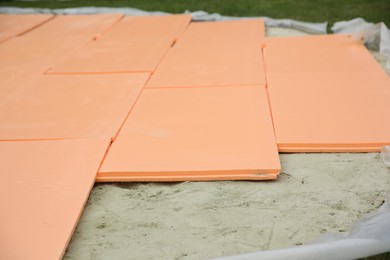 Photo of Under pool foam tiles on in backyard