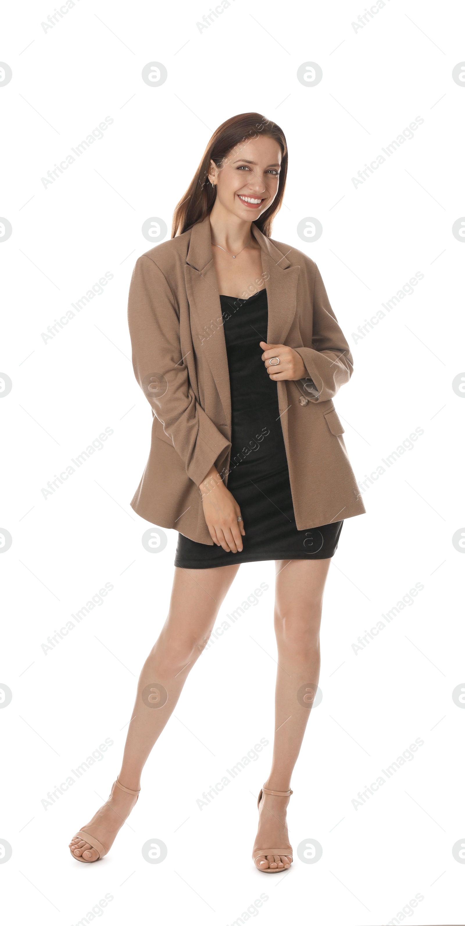 Photo of Beautiful woman in stylish brown jacket and black dress on white background