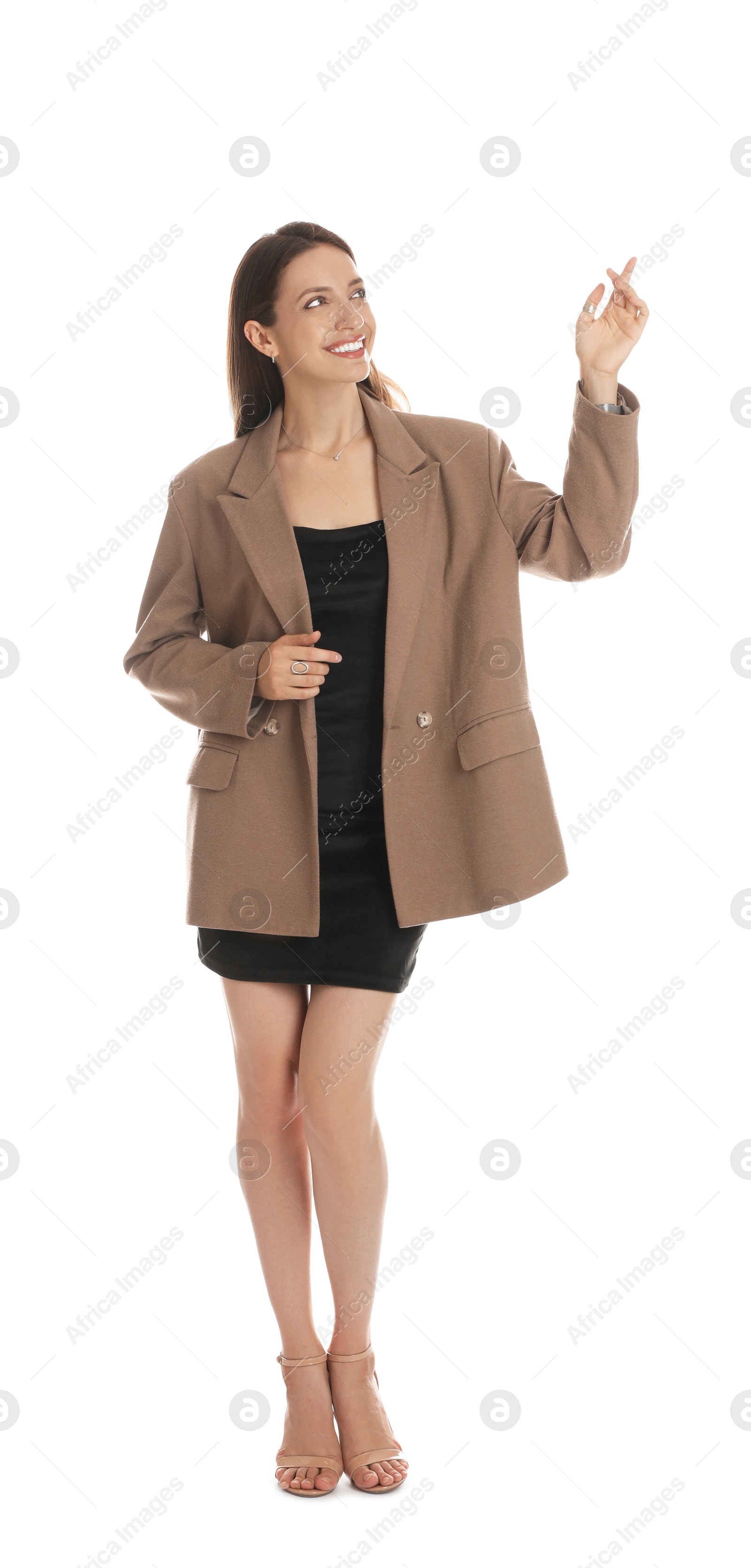 Photo of Beautiful woman in stylish brown jacket and black dress on white background