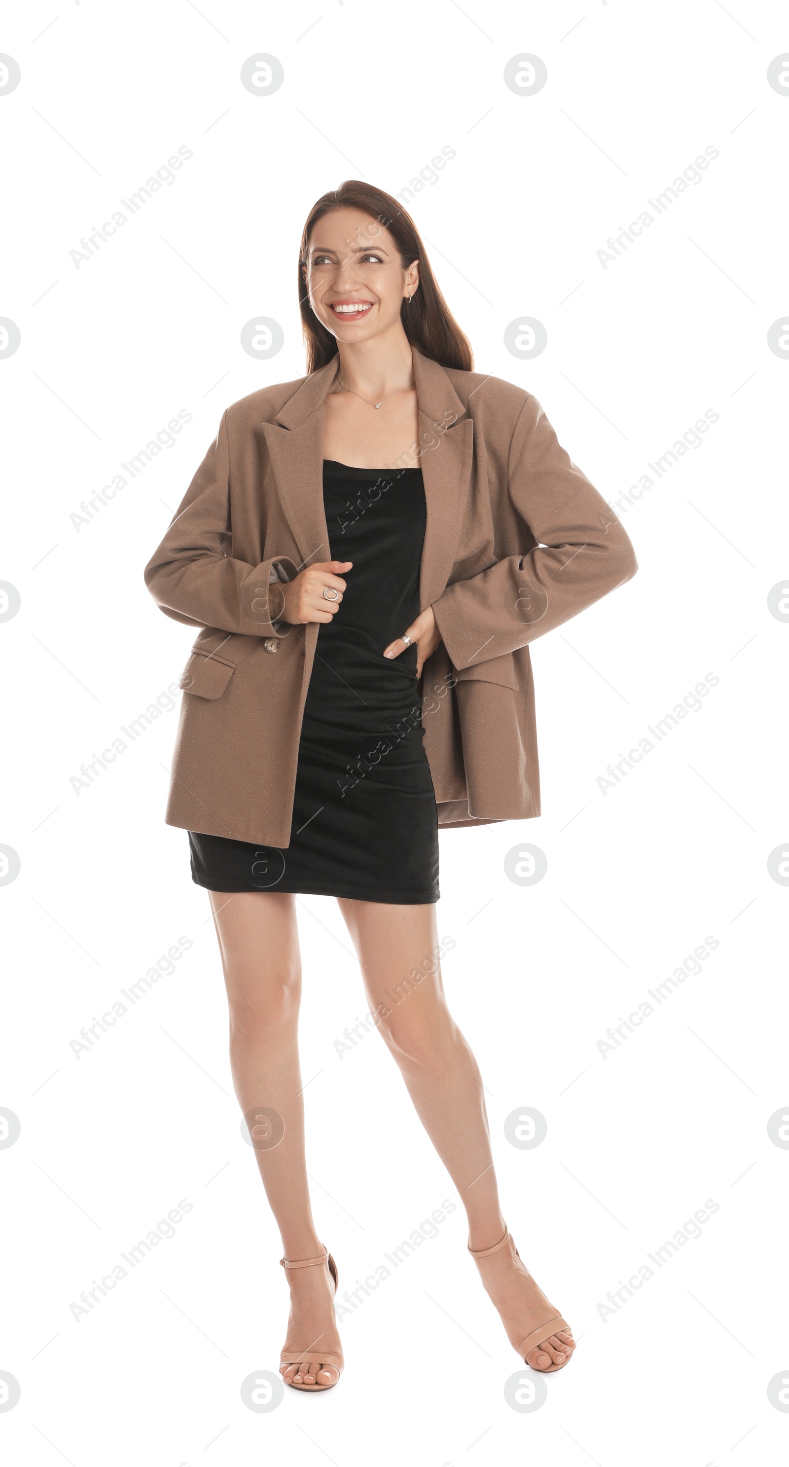 Photo of Beautiful woman in stylish brown jacket and black dress on white background