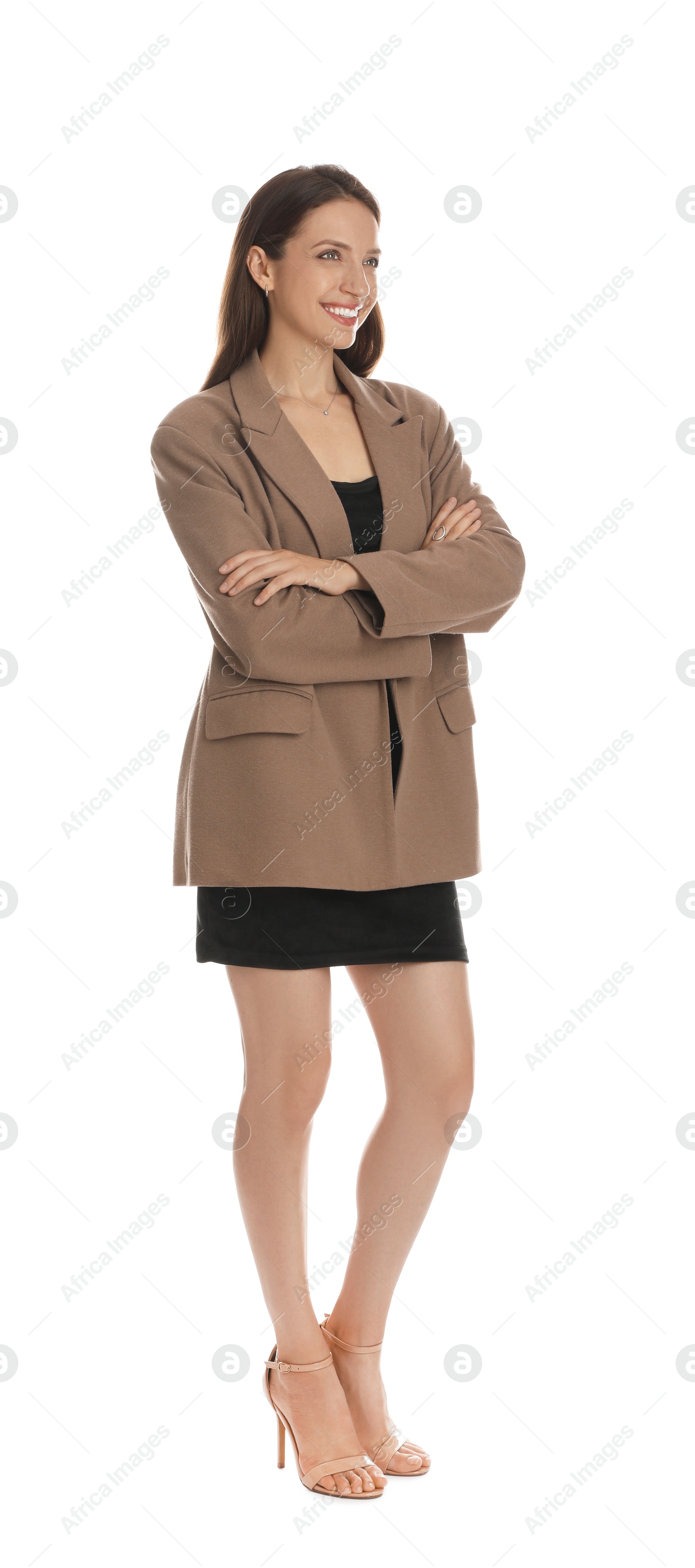 Photo of Beautiful woman in stylish brown jacket and black dress on white background