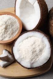 Photo of Coconut flour and fresh fruits on table, flat lay