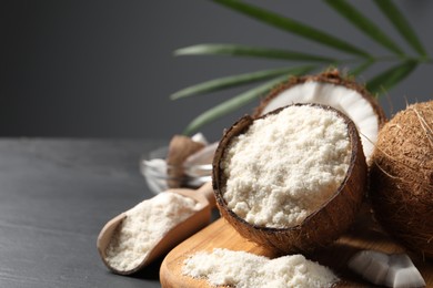 Photo of Organic coconut flour and fresh fruits on table, closeup. Space for text