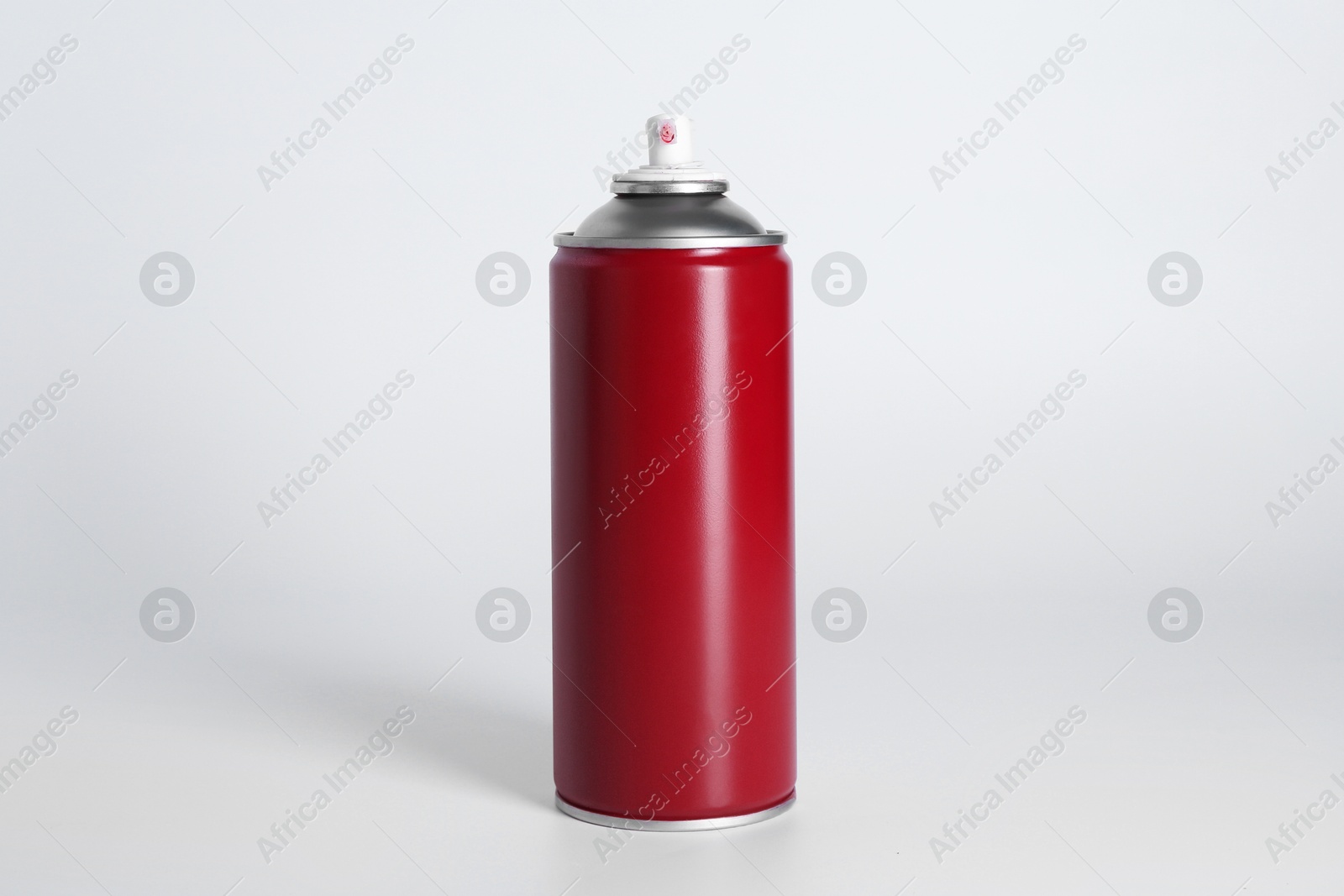 Photo of Can of spray paint on white background