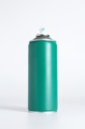 Photo of Can of spray paint on white background