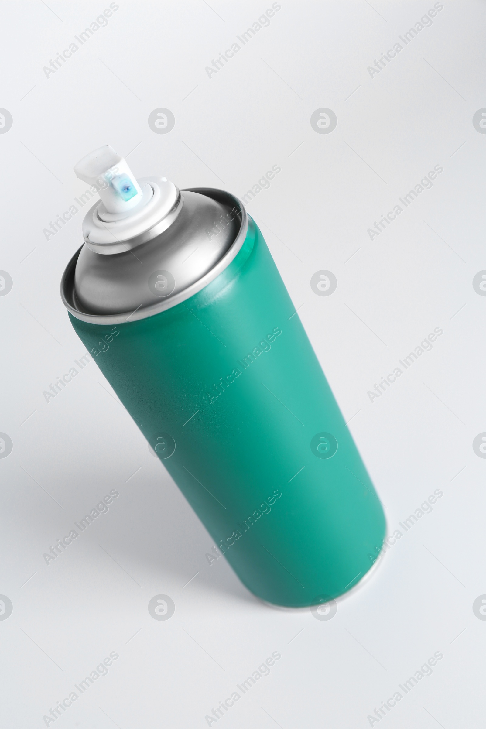 Photo of Can of spray paint on white background