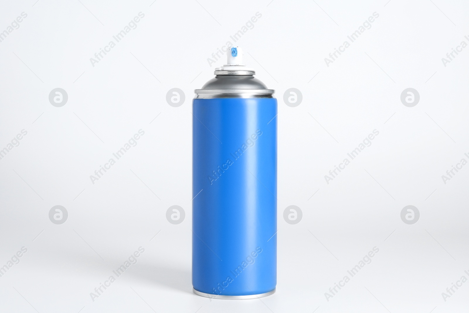 Photo of Can of spray paint on white background