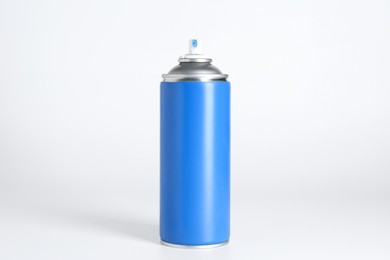 Photo of Can of spray paint on white background