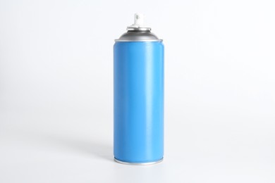 Photo of Can of spray paint on white background