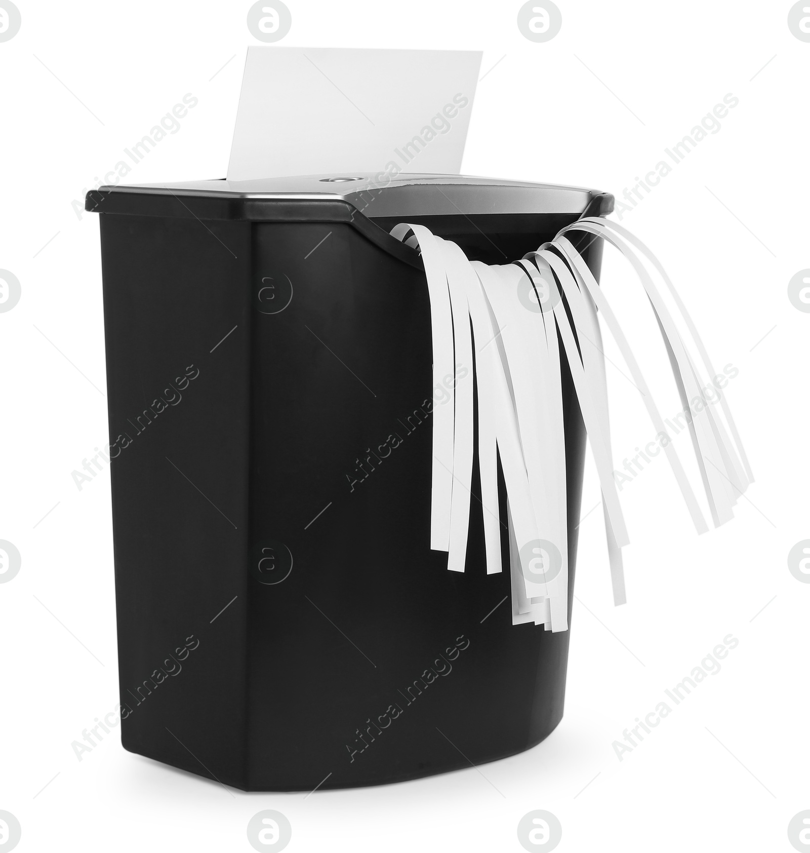 Photo of Destroying sheet of paper with shredder on white background