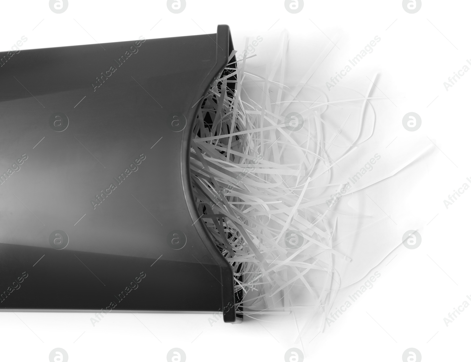 Photo of Black basket and shredded paper isolated on white, top view