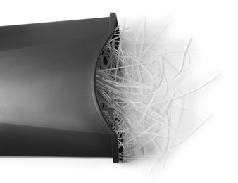 Photo of Black basket and shredded paper isolated on white, top view