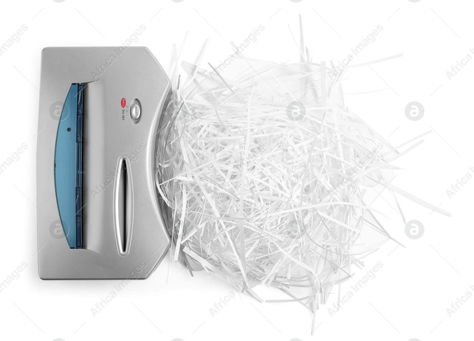 Photo of Shredder and paper strips isolated on white, top view