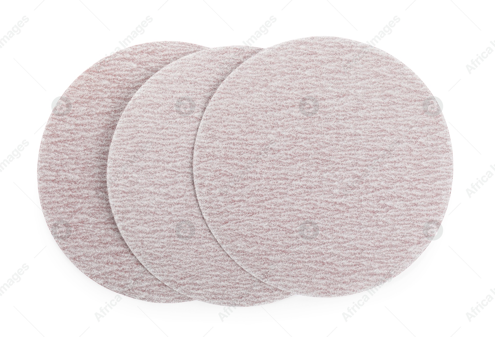 Photo of Coarse sandpaper disks isolated on white, top view