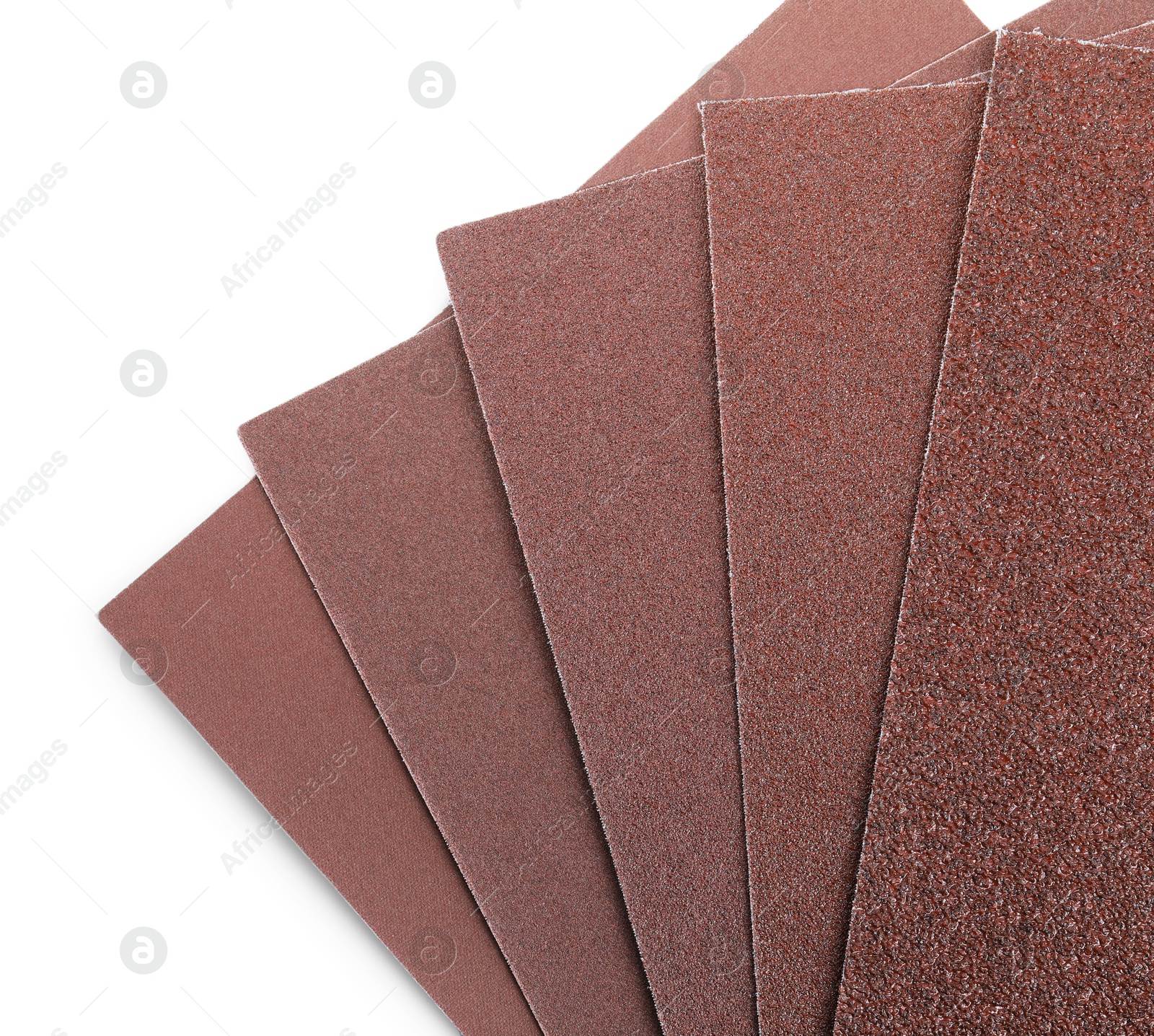 Photo of Sheets of sandpaper isolated on white, top view