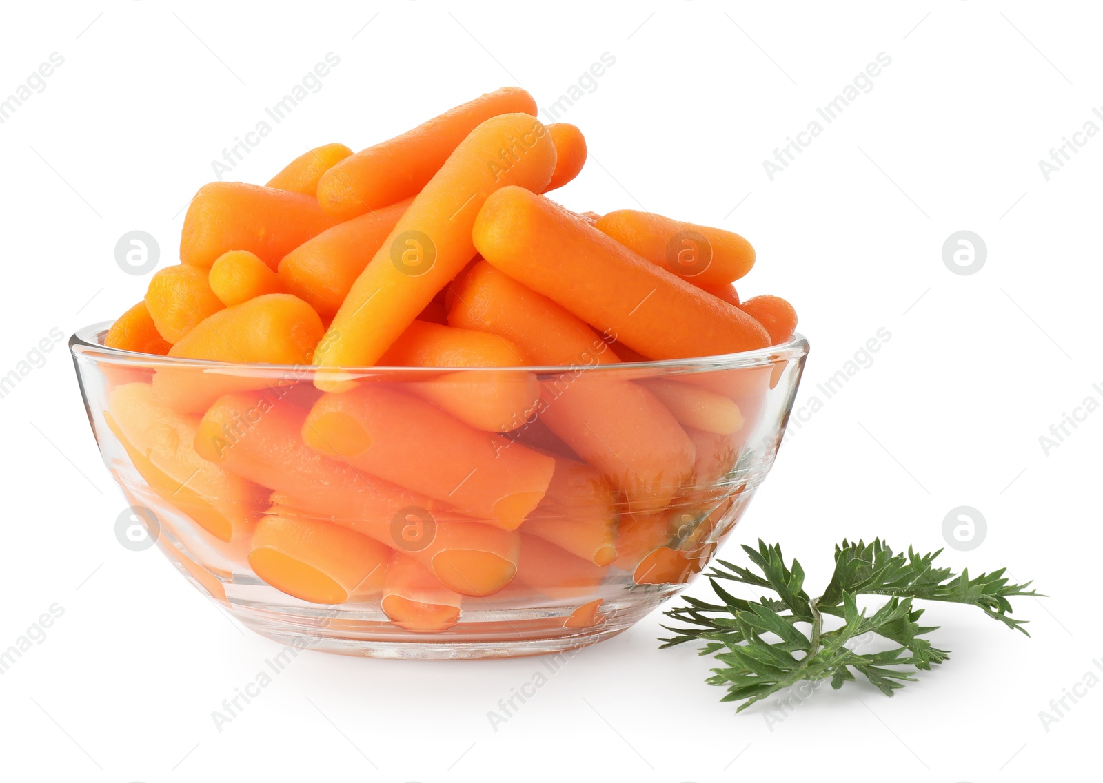 Photo of Baby carrots in bowl and green leaf isolated on white