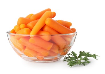 Photo of Baby carrots in bowl and green leaf isolated on white