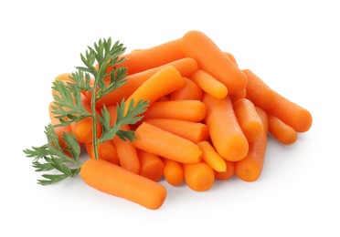 Baby carrots and green leaf isolated on white