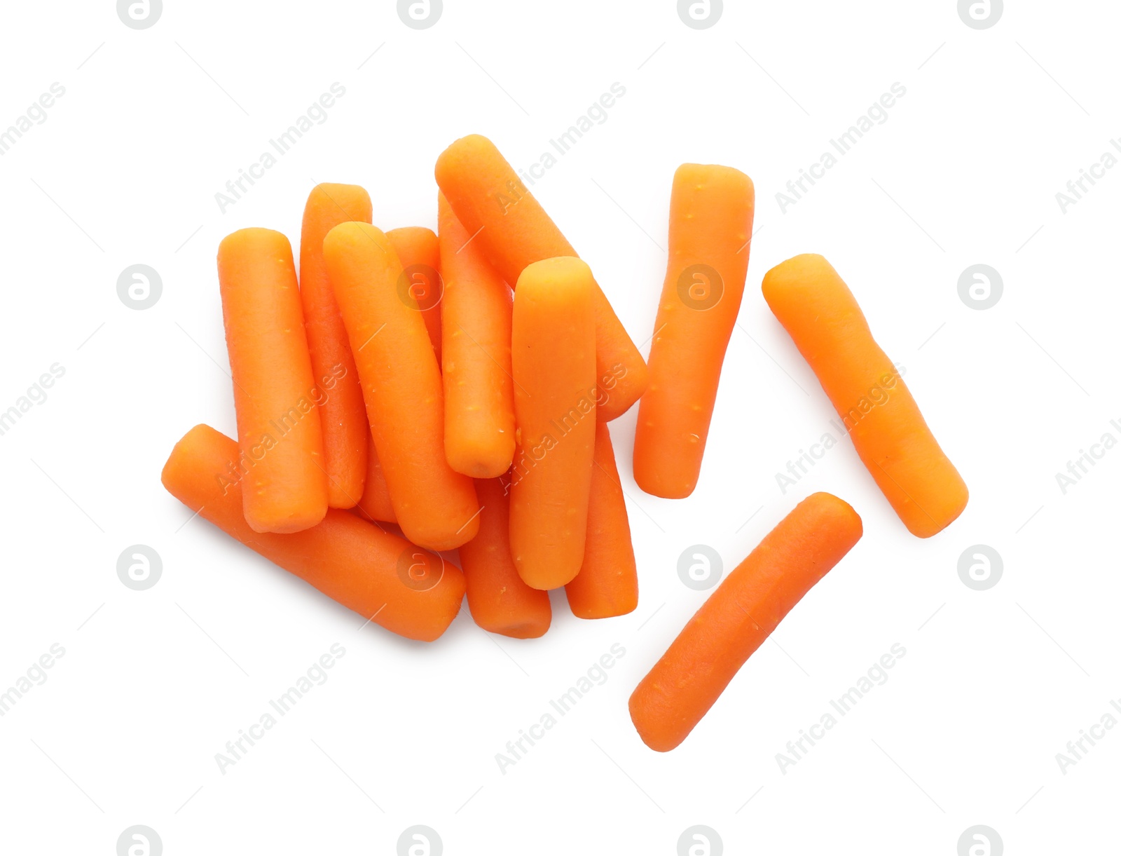 Photo of Pile of baby carrots isolated on white, top view