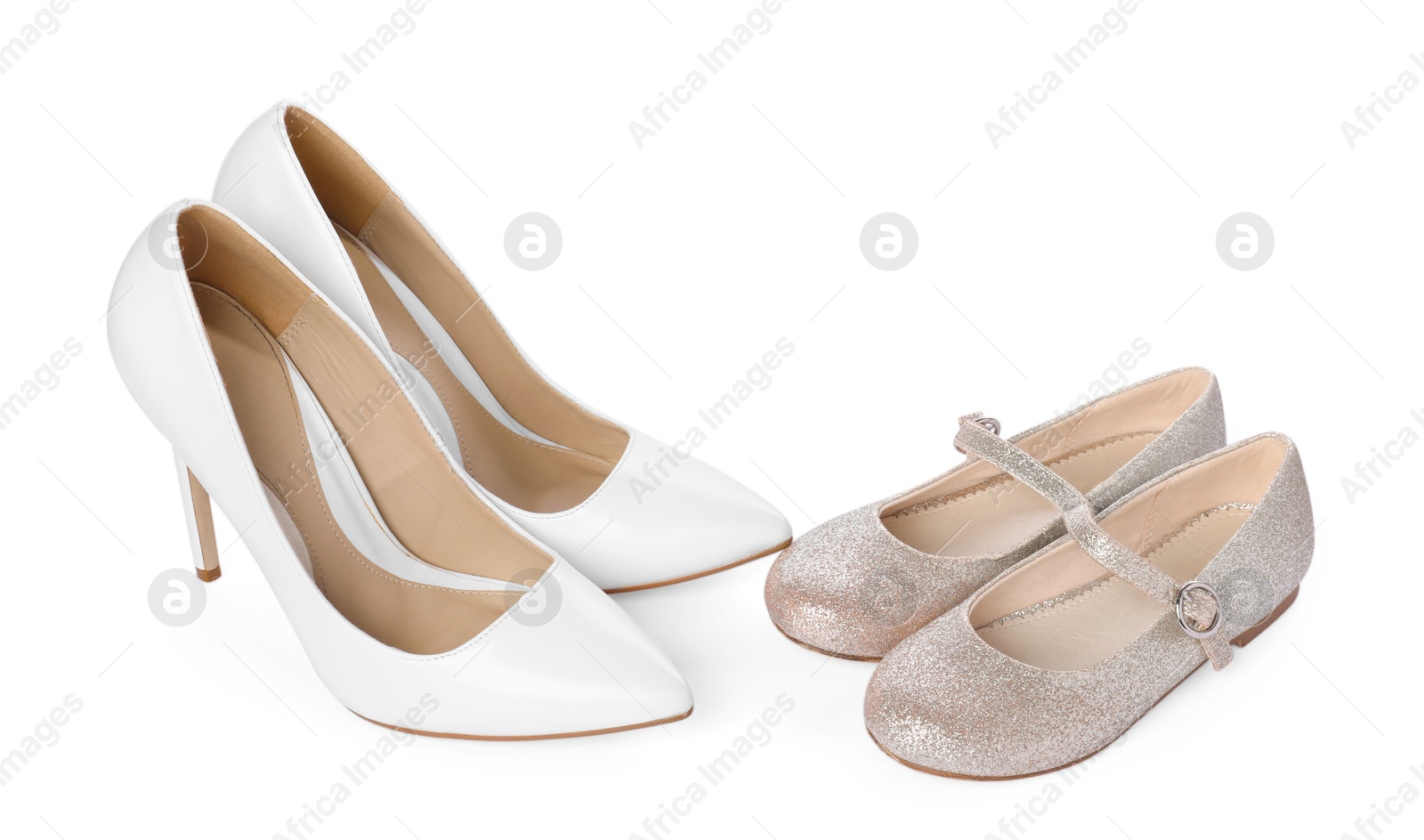 Photo of Big and small shoes isolated on white