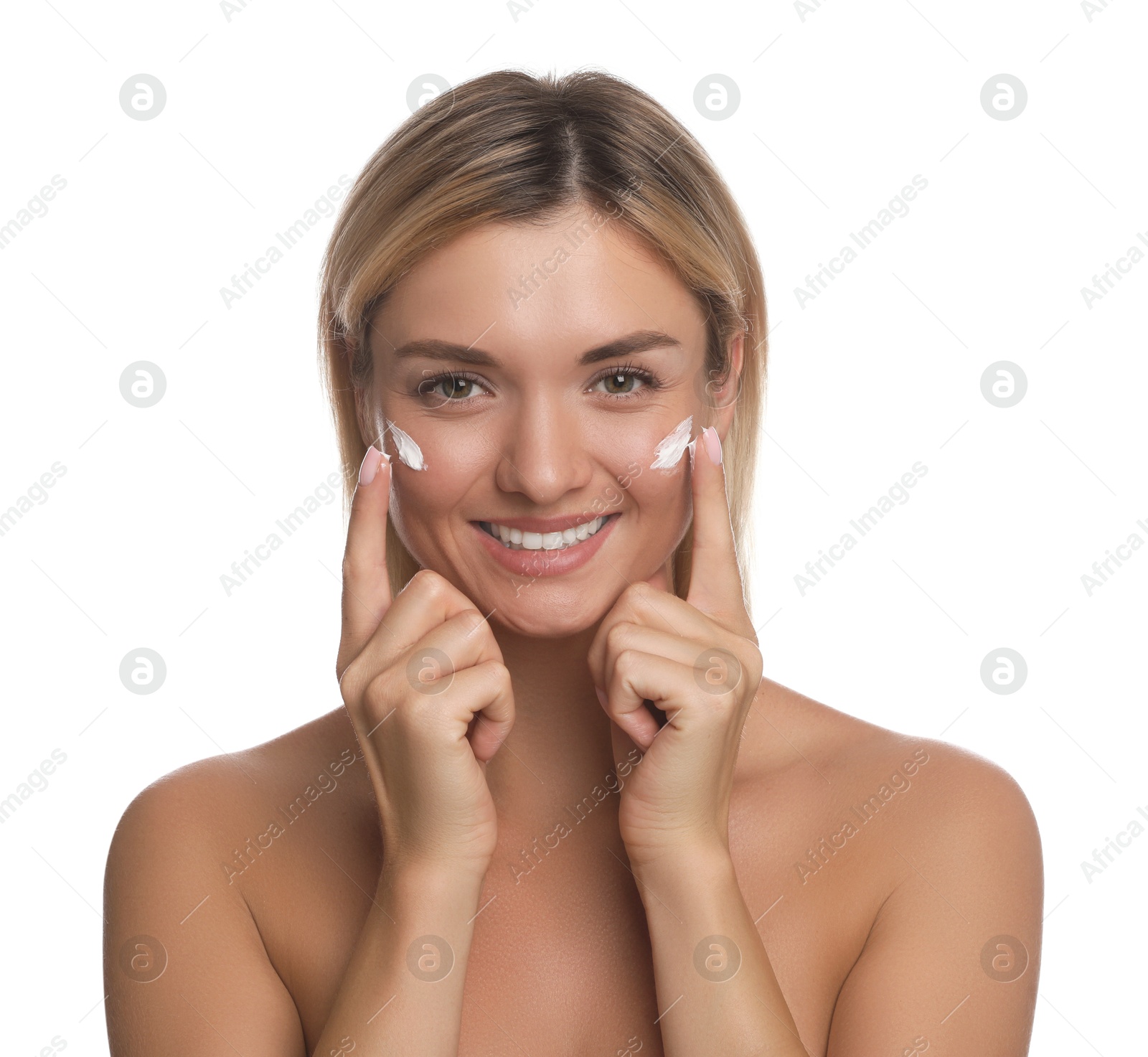 Photo of Beautiful woman applying face cream on white background