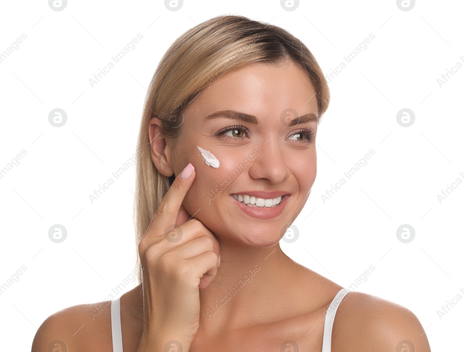 Photo of Beautiful woman with cream on her face against white background