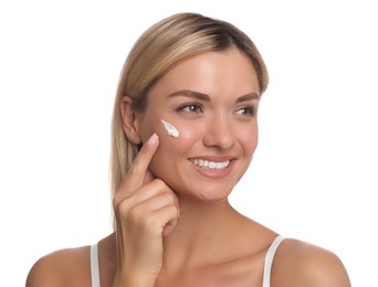 Photo of Beautiful woman with cream on her face against white background