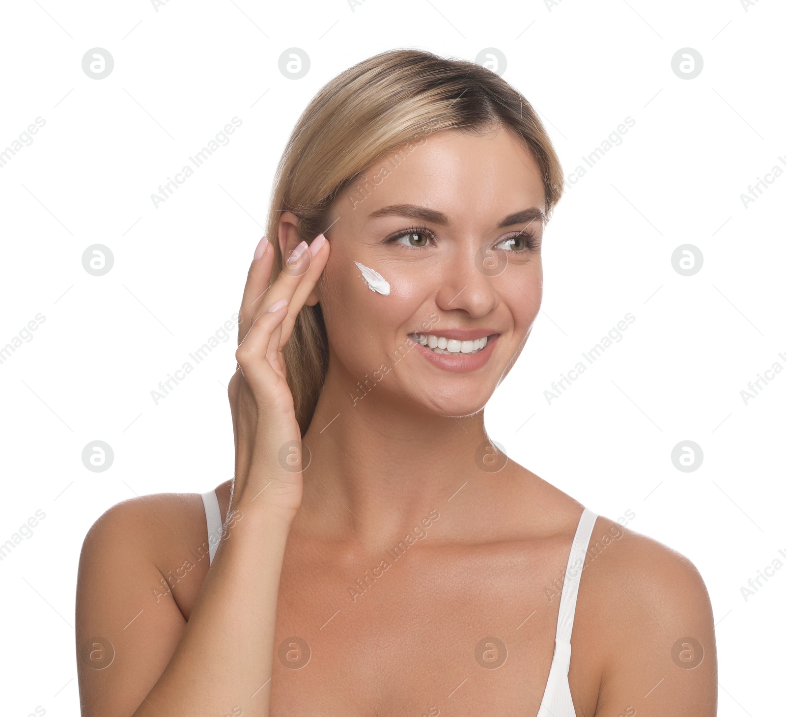 Photo of Beautiful woman with cream on her face against white background