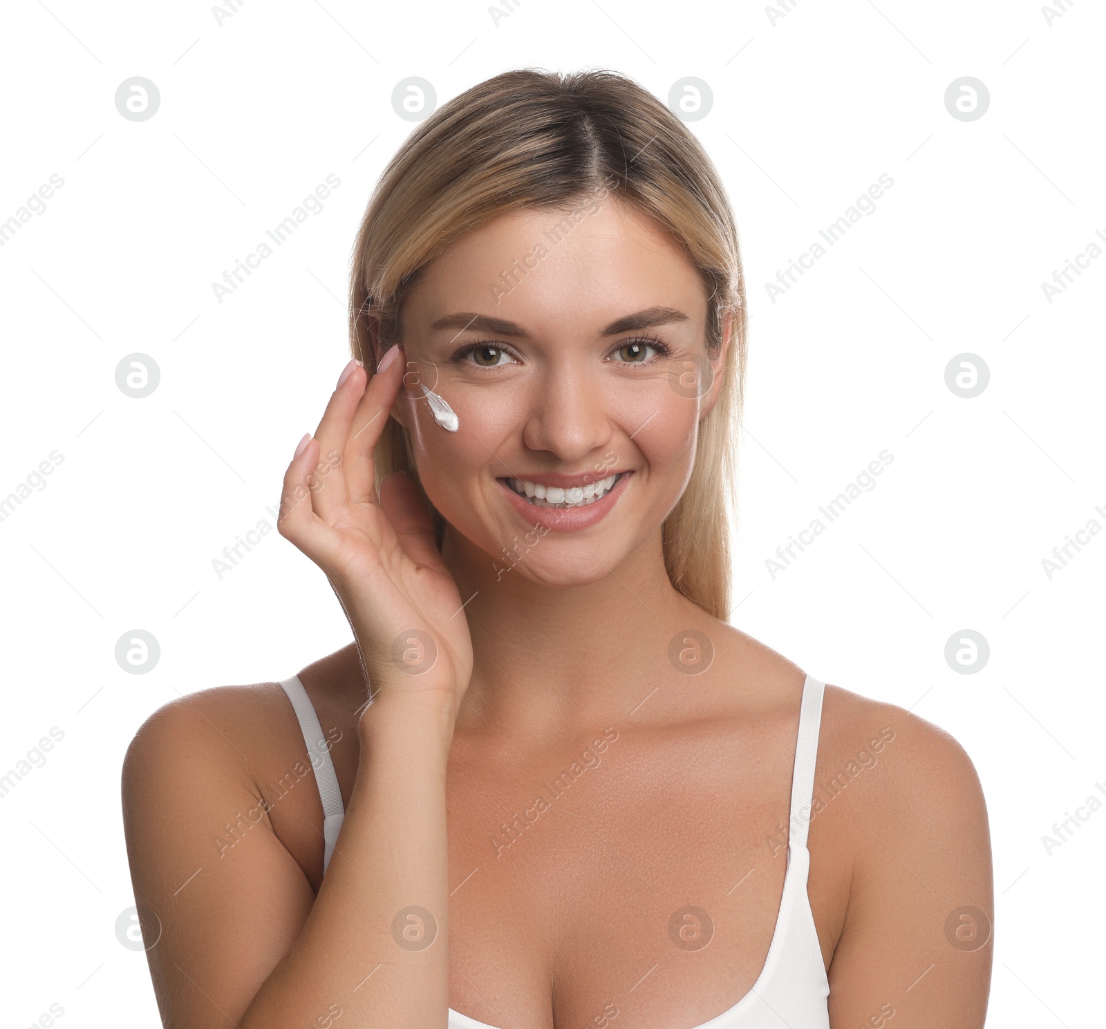 Photo of Beautiful woman with cream on her face against white background