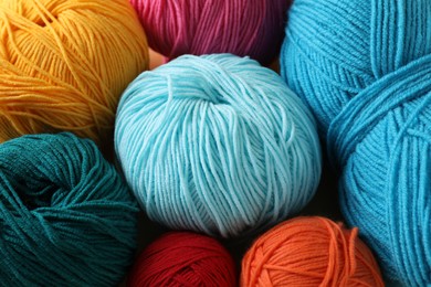 Photo of Many different yarns as background, closeup view