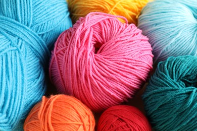 Photo of Many different yarns as background, closeup view