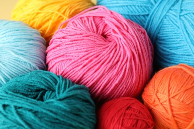 Photo of Many different yarns as background, closeup view