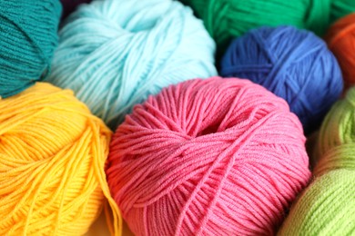 Photo of Many different yarns as background, closeup view