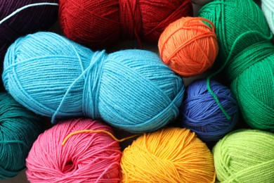 Many different yarns as background, top view