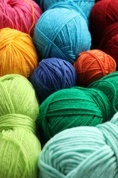 Many different yarns as background, closeup view