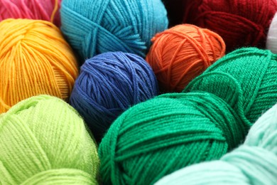 Photo of Many different yarns as background, closeup view