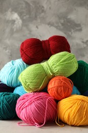 Pile of different yarns on light table