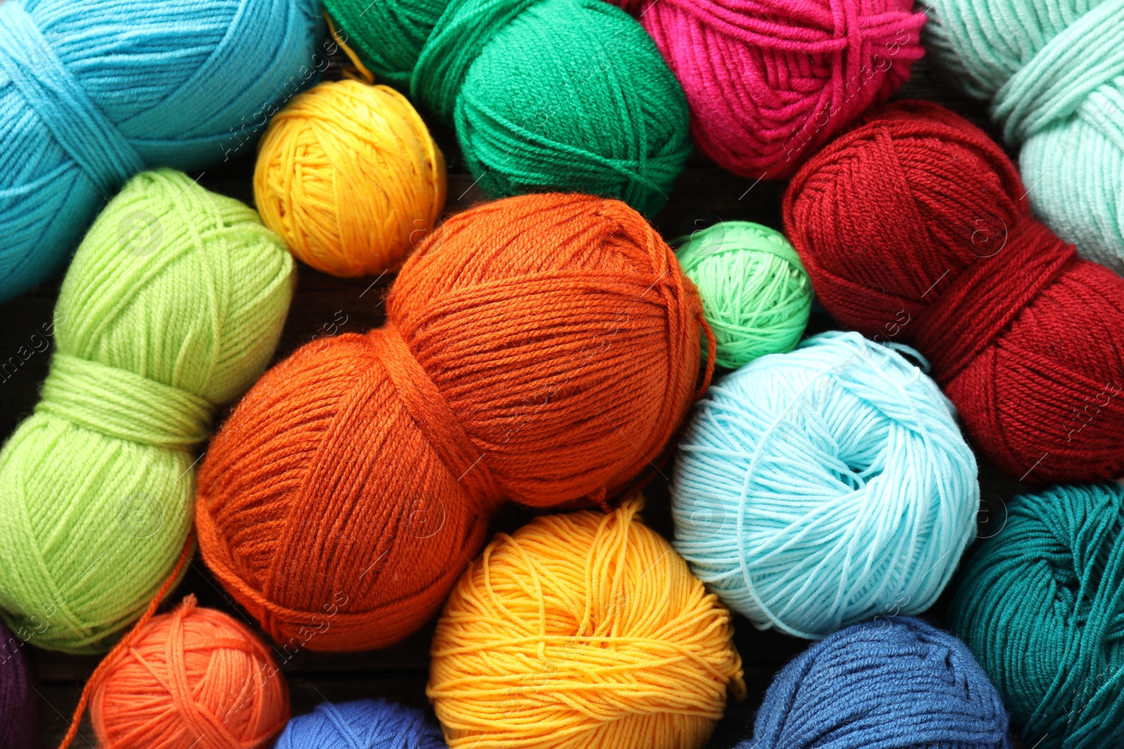 Photo of Many different yarns as background, top view