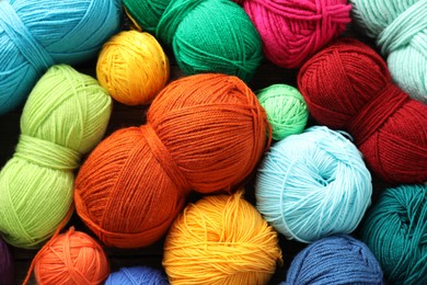 Photo of Many different yarns as background, top view