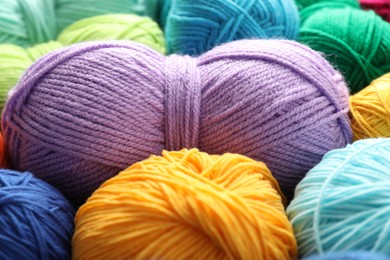 Many different yarns as background, closeup view