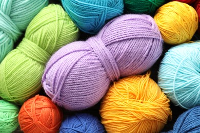 Many different yarns as background, top view