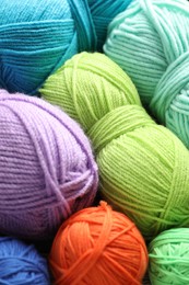 Many different yarns as background, above view